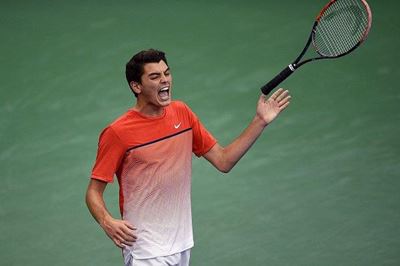 Federer to face fearless teen Fritz