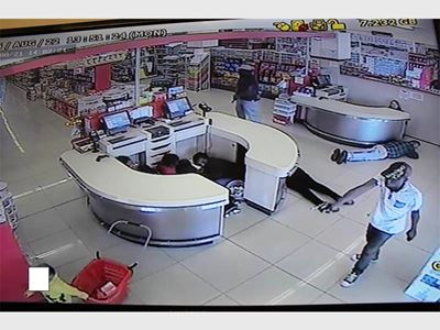 Gunman seen aiming weapon at child