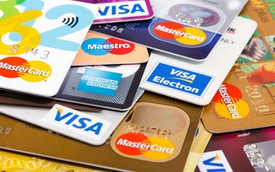 Women are the better spenders when it comes to credit cards