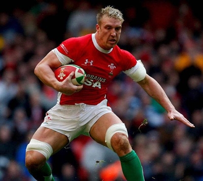Former Wales star Powell retires