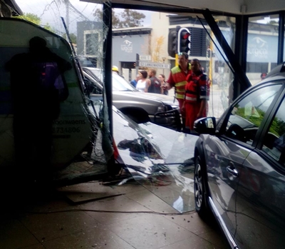 Vehicle crashes into Honda showroom