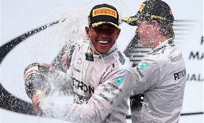 Hamilton beats title rival Rosberg to pole