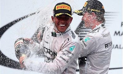 Hamilton beats title rival Rosberg to pole