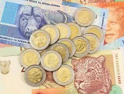 Rand gains on global risk rally