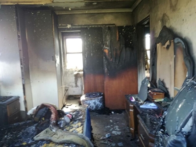 Bewaarder se huis aan die brand gesteek