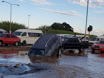 Car ends up in sinkhole