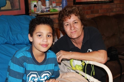 Injured chess champ back home