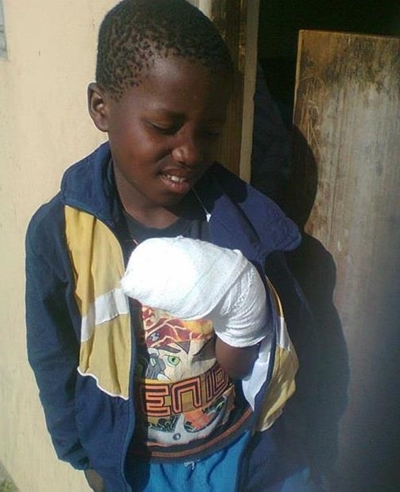 Boy loses fingers to refuse truck