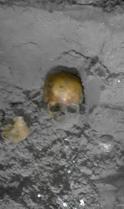 Skull and bones discovered in caves