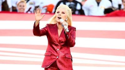 Lady Gaga soars over Super Bowl stage with bow to inclusion