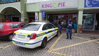 Police vehicle in disabled parking