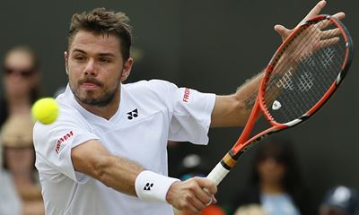 Wawrinka advances, Berdych stunned
