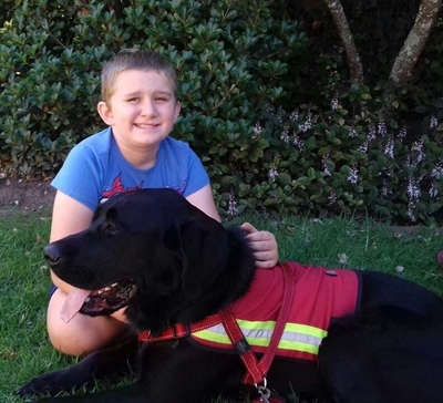 Boy gets Autism Support Dog