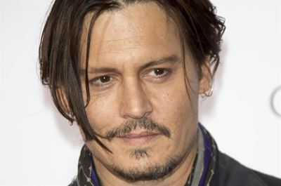 Johnny Depp apologises