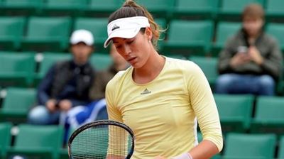Muguruza powers into semifinals