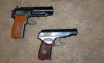 Two arrested, firearms recovered
