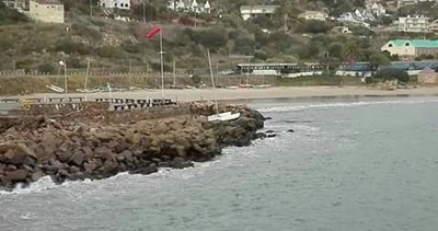 Hobie cat on the rocks