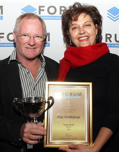 Double honour for sports editor