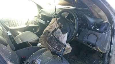 Stilstaande motor vat vlam