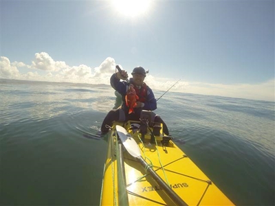 Essie en sy kabeljou wen kayak-hengel