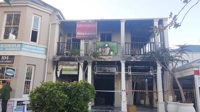 Bruised businesses brave effects of fire