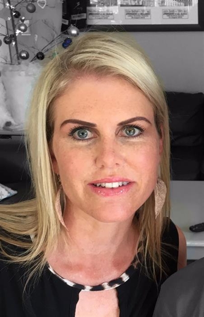 Local businesswoman battles big guns