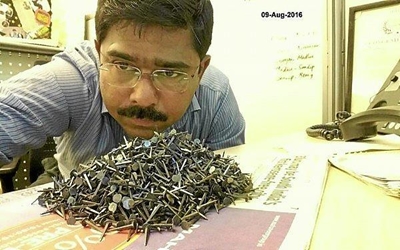 Indian engineer 'fishes' for nails