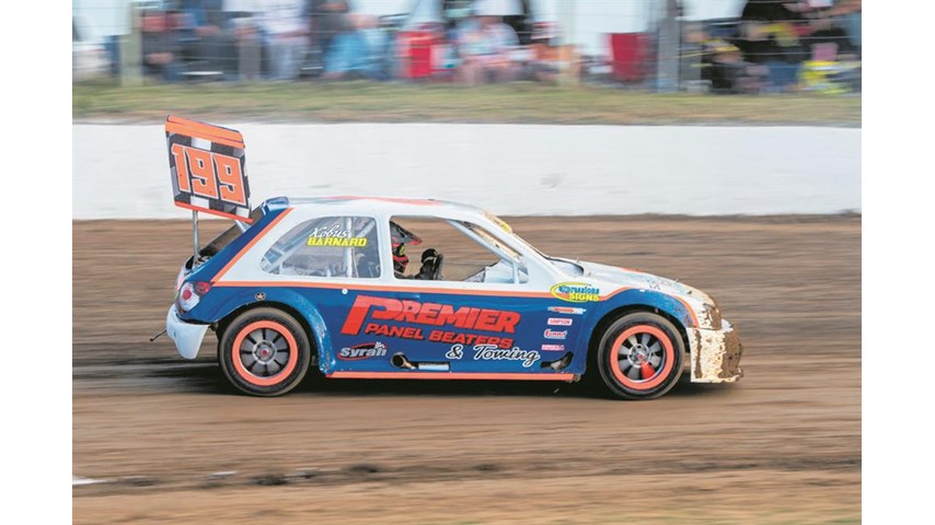 High-speed action at national oval racing spectacle | George Herald