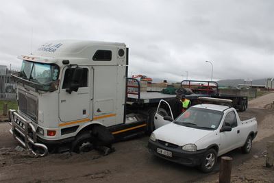 Truck in pothole causes backlog